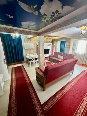 a living room with a couch and a table at İmmortal Hotel İstanbul in Istanbul
