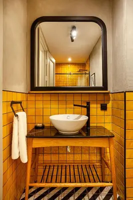 a bathroom with a sink and a mirror at World House Boutique Hotel Galata in Istanbul