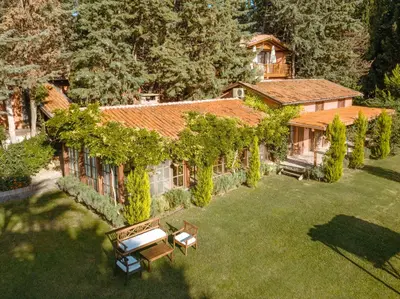 an aerial view of a house with a yard at The Lake House in Boyalıca