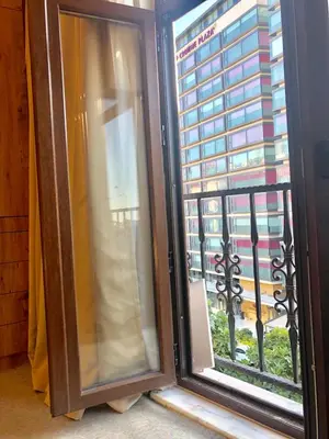 a window with a view of a building at NOUR SUITE & RESIDENCE in Istanbul