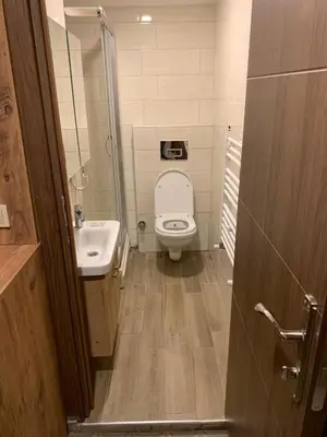 a small bathroom with a toilet and a sink at NOUR SUITE & RESIDENCE in Istanbul