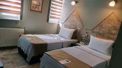 a room with two beds in a room at Royal Park Hotel Corlu Bed and Breakfast in Tekirdag