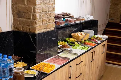 a buffet with many different types of food on display at Kupa HOTEL in Istanbul