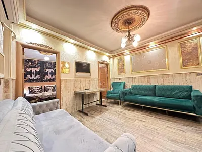 a living room with a couch and a table at Maranda Suit Hotel in Istanbul