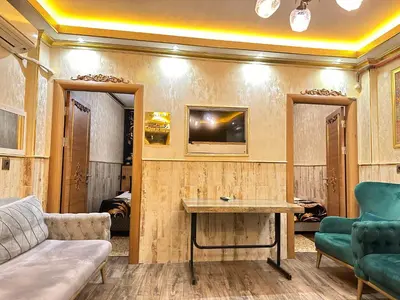 a living room with a couch and a table at Maranda Suit Hotel in Istanbul