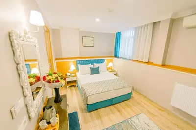 a hotel room with a bed in a room at Acacia Mansion Hotel in Istanbul