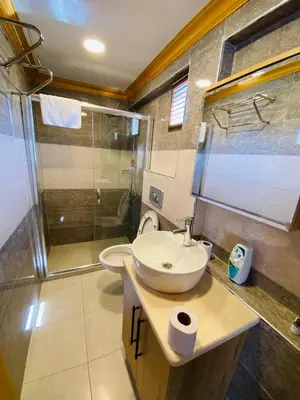 a bathroom with a sink and a shower at Golden Sail Hotel Old City in Istanbul