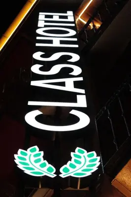 a neon sign that says seattle sign in a room at Class Hotel Bosphorus With Jacuzzi in Istanbul