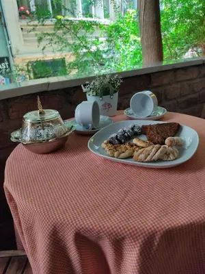 a table with a plate of food on a table at Siesta Premium Hotel in Istanbul