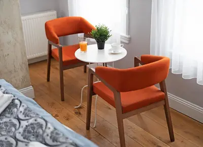 a table with two chairs and a table with two drinks at Galata Door Hotel in Istanbul
