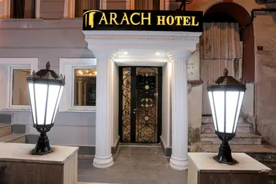 a hotel with two lights in front of a door at Arach Hotel Harbiye in Istanbul