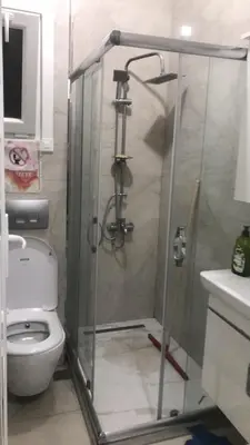 a bathroom with a shower and a toilet at Hakan’s apartment in Istanbul