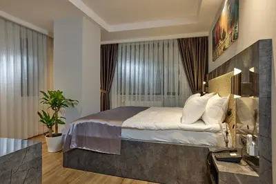 a bedroom with a large bed in a room at The Bold Hotel in Istanbul