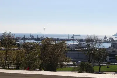 a view of a city with trees and a harbor at HOTEL ÜMİT YENİKAPI in Istanbul