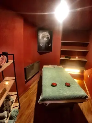 a room with a table with two red peppers on it at Family Resort Hotel in Selimpasa