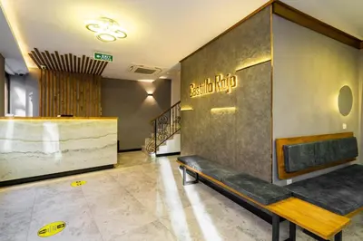 a waiting room with a bench in a building at Castillo Rojo Hotel Istanbul in Istanbul