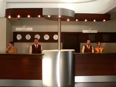 a group of men standing behind a counter in a bar at İğneada Resort Hotel & SPA in Igneada