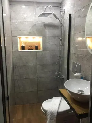 a bathroom with a shower and a toilet and a sink at Valeria House in Istanbul