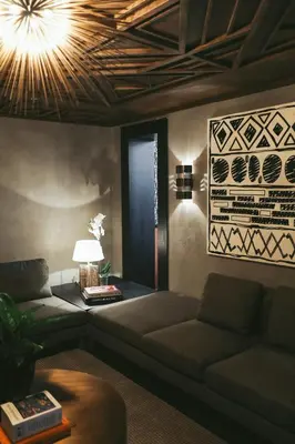 a living room with a couch and a table at Root Hotel Karaköy Bosphorus in Istanbul