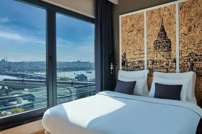 a bedroom with a bed and a large window at The Halich Hotel Istanbul Karakoy - Special Category in Istanbul