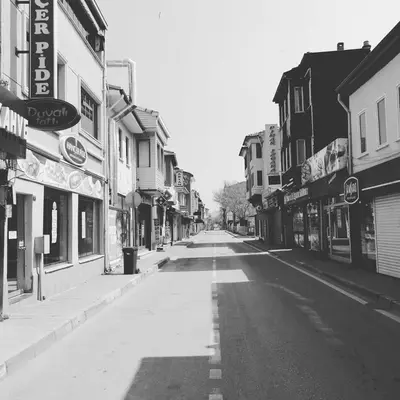 a black and white photo of an empty city street at Hotel Mudanya in Mudanya