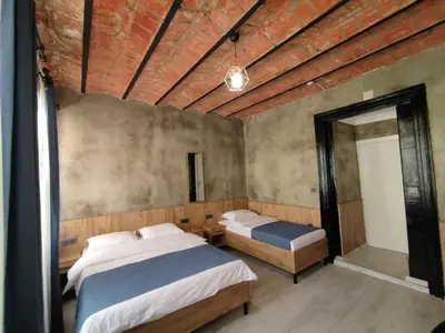 a bedroom with two beds and a mirror at Life Span Hotels in Istanbul