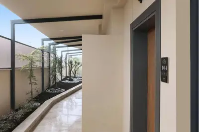 an external entrance to a building with a walkway at N'Ala Otel in Sakarya