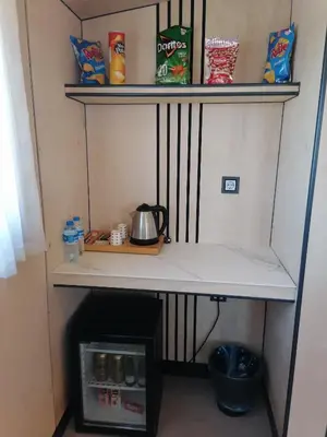 a shelf in a kitchen with some food on it at N'Ala Otel in Sakarya