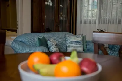 a bowl of fruit on a table in a living room at The Charm Hotel - Old City in Istanbul