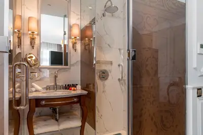 a bathroom with a sink and a shower at Orientbank Hotel Istanbul, Autograph Collection in Istanbul