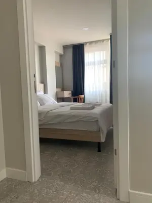 a bedroom with a bed and a window at Taksim Galatist Hotel in Istanbul
