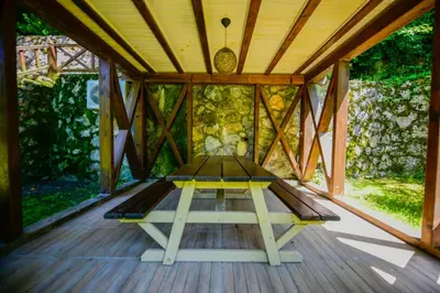 a meditation room in a wooden house with a table at Naturkoy Sapanca in Sakarya