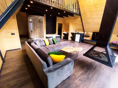 a living room with a couch and a table at Naturkoy Sapanca in Sakarya