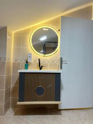 a bathroom with a sink and a mirror at Sapanca Albar Konaklama in Sapanca