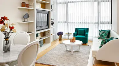 a living room with a couch and a table at G Tower Furnished Apartment Rentals in Istanbul