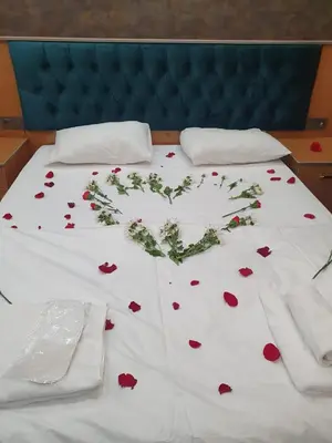 a bed with a heart made out of roses on it at BoNaMi Hotel in Istanbul