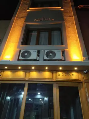 a building with a sign on top of it at BoNaMi Hotel in Istanbul