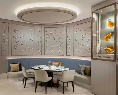 a dining room with a table and chairs at Address Istanbul in Istanbul