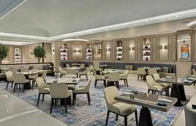 a restaurant with tables and chairs at Address Istanbul in Istanbul