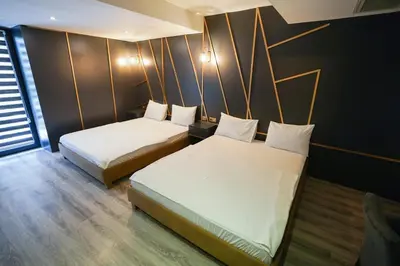 two beds in a room with two beds sidx sidx sidx sidx at Time Hotel Mecidiyekoy in Istanbul