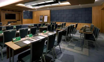 a large room with rows of tables and chairs at Radisson Blu Hotel, Istanbul Sisli in Istanbul