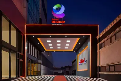 a building with a sign on the side of it at Ramada Encore by Wyndham Istanbul Avcilar in Istanbul