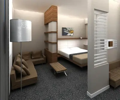 a small bedroom with a bed and a couch at Hotel Yenibosna in Istanbul