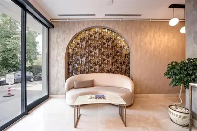 a living room with a couch and a table at The Pearl Suites in Istanbul