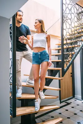a man and a woman standing on a stairs at RW BOUTIQUE HOTEL in Istanbul