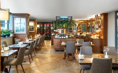 a restaurant with tables and chairs and a bar at Aspera Hotel Golden Horn in Istanbul