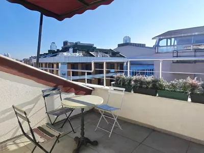 a table and two chairs sitting on a balcony at Family Time Suites Hotel in Istanbul