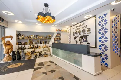 a store with a lot of figurines on display at Comfort Suites Hotel in Istanbul