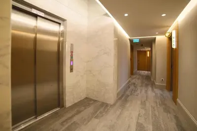 a hallway with a elevator in a building at Dosso Dossi Hotels Yenikapı in Istanbul