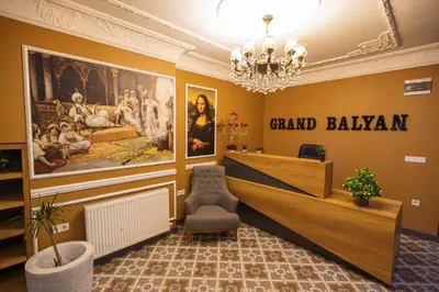 a waiting room at the grand bazaar with a chandelier at Grand Balyan Hotel & Restaurant in Istanbul